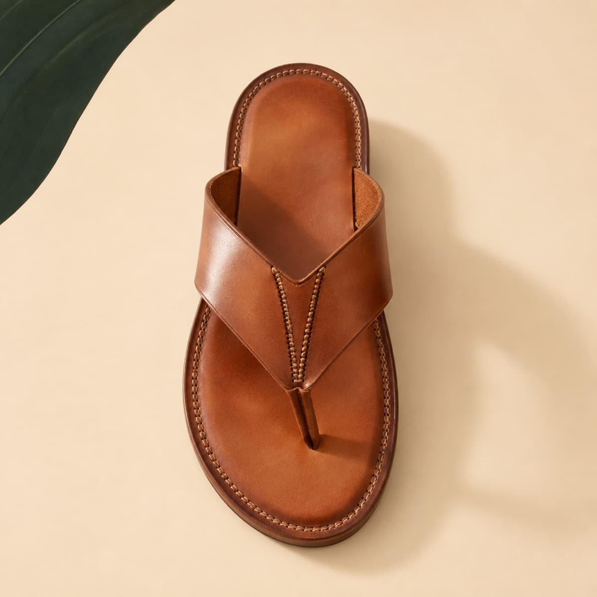 Toe-Post Premium, photographed from above against a sand-beige background